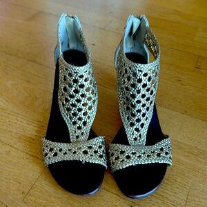 Donald Pliner light gold metallic leather cut out booties.